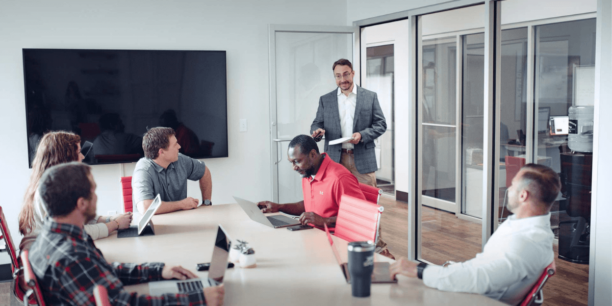 Conference room with Jones Capital employees during a meeting