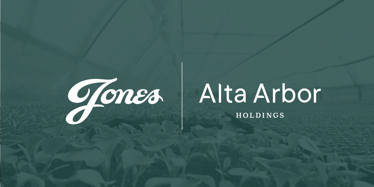 Jones Capital and Alta Arbor logos side by side in front of a picture of a commercial greenhouse 